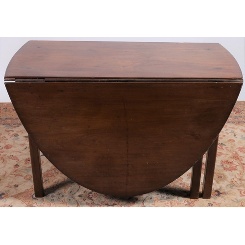 419 - A GEORGIAN MAHOGANY DROP LEAF TABLE the oval hinged top raised on square moulded legs 
72cm (h) x 63... 