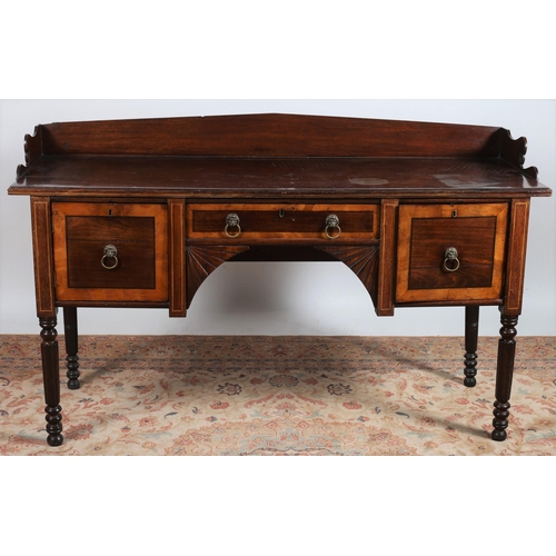 420 - A REGENCY MAHOGANY SIDEBOARD of rectangular outline the shaped top with moulded three quarter galler... 