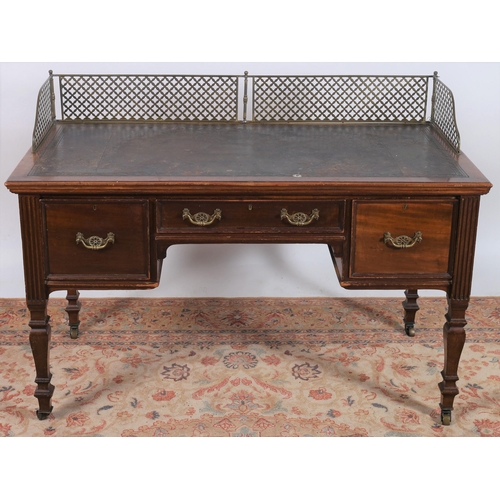 424 - A 19TH CENTURY MAHOGANY WRITING DESK by Maple & Co. Ltd. the rectangular tooled leather top with pie... 