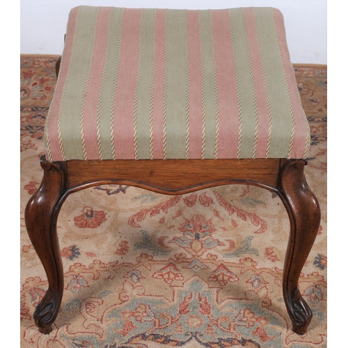 432 - A 19TH CENTURY MAHOGANY AND UPHOLSTERED STOOL the rectangular detachable seat with shaped apron on c... 