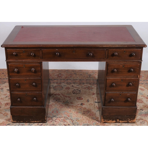 433 - A 19TH CENTURY MAHOGANY PEDESTAL DESK of rectangular outline the shaped top with writing surface abo... 