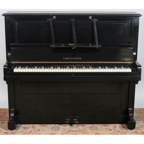 442 - A BECHSTEIN EBONISED CASED UPRIGHT PIANO
Serial no. 50423
128cm (h) x 147cm (w) x 60cm (d)
together ... 