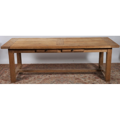 461 - A VINTAGE PLANKED TOP BREAKFAST TABLE the shaped top above two frieze drawers on square moulded cham... 