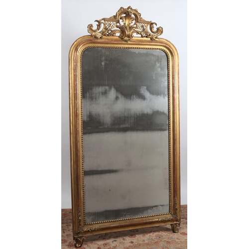 465 - A 19TH CENTURY GILTWOOD AND GESSO MIRROR the rectangular plate within a beadwork and moulded frame w... 