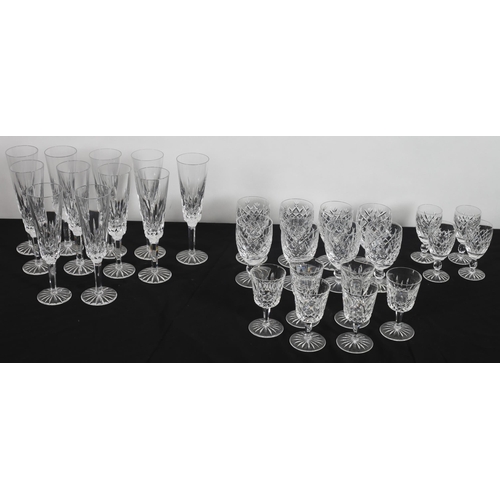 469 - A LARGE COLLECTION OF GLASSWARE to include champagne flutes, wine glasses, comports, water jugs, cha... 