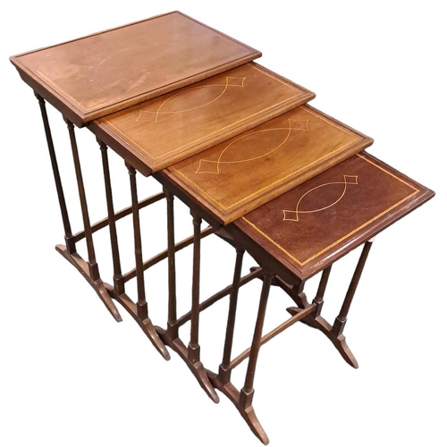 502 - A VINTAGE MAHOGANY AND SATINWOOD INLAID NEST OF QUARTETTO TABLES each of rectangular outline with mo... 