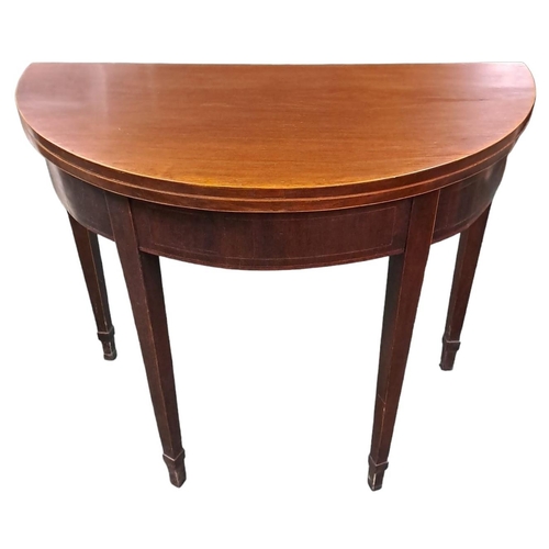 507 - A 19TH CENTURY MAHOGANY AND SATINWOOD INLAID FOLDOVER SUPPER TABLE of demi lune outline the shaped h... 