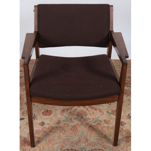 510 - A VINTAGE TEAK AND UPHOLSTERED ELBOW CHAIR the rectangular shaped upholstered back and seat with pan... 