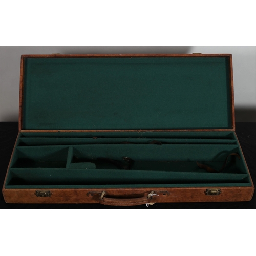 519 - A LEATHER BOUND TRAVELLING GUN CASE with brass clasps 
9cm (h) x 80cm (w) x 29cm (d