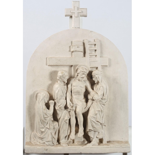 545 - TWELVE TERRACOTTA WHITE PAINTED STATIONS OF THE CROSS each of rectangular arched form moulded in hig... 