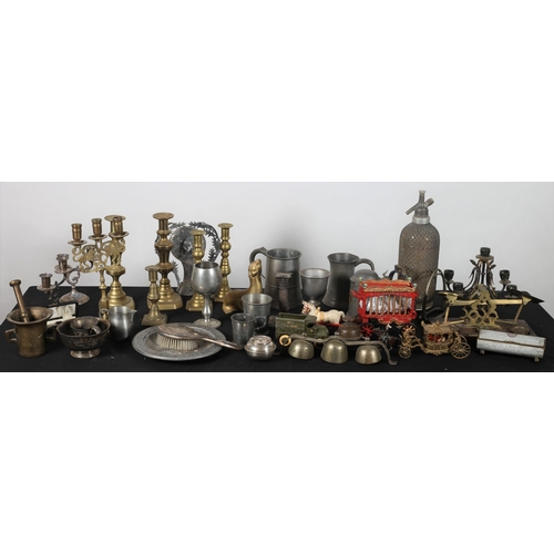 586 - A MISCELLANEOUS COLLECTION to include two pairs of brass candlesticks, a pair of plated candelabra, ... 