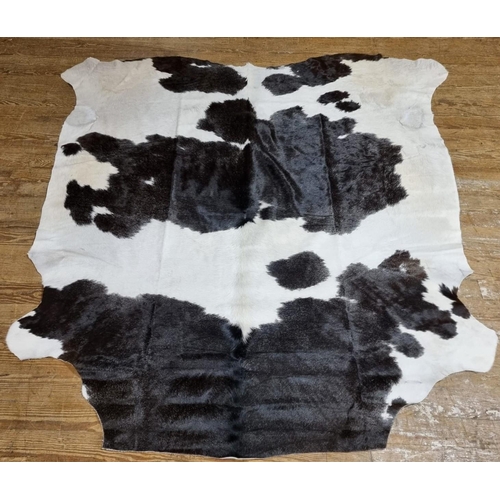 597 - AN AUTHENTIC NGUNI CATTLE HIDE from the Kwa-Zulu Natal Midlands in South Africa. Superior quality, e... 