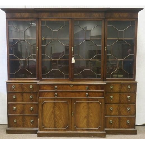 615 - A GEORGIAN DESIGN MAHOGANY LIBRARY SECRETAIRE BOOKCASE the moulded cornice above four astragal glaze... 