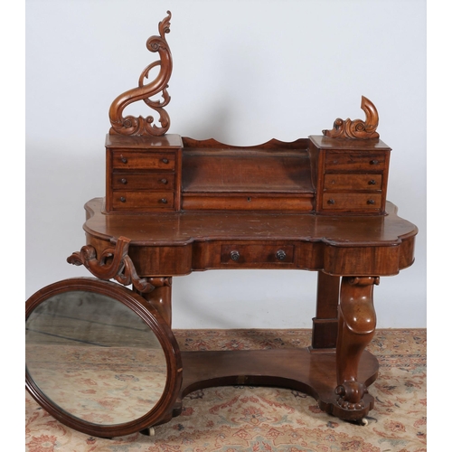 621 - A VICTORIAN MAHOGANY DUCHESS DRESSING TABLE the superstructure with swivel mirror above a hinged com... 