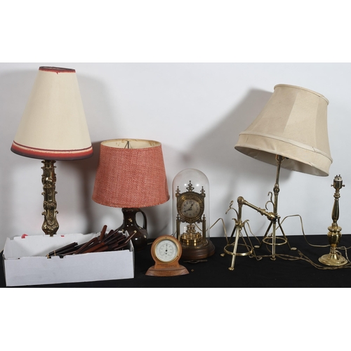 635 - A MISCELLANEOUS COLLECTION to include a pair of brass table lamps each with adjustable arm raised on... 