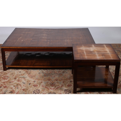 640 - A STAINED WOOD COFFEE TABLE of rectangular outline the shaped top raised on square moulded legs join... 