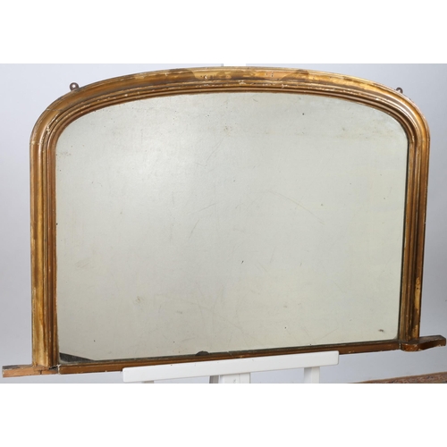 652 - AN EBONISED MIRROR the rectangular plate within a gilt border 
89cm (h) x 72cm (w)
A 19TH CENTURY GI... 