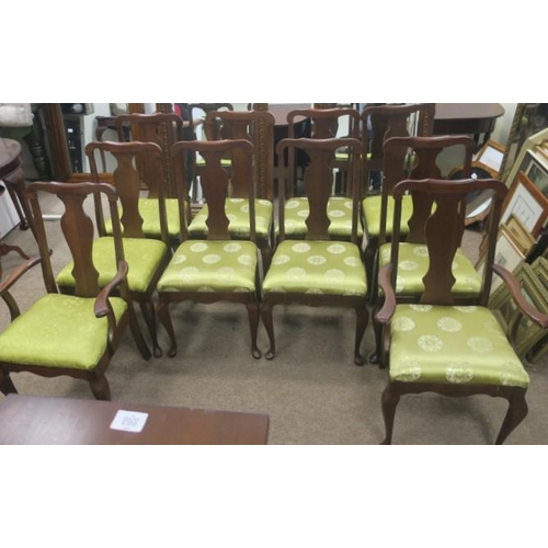 664 - A SET OF TEN QUEEN ANNE DESIGN MAHOGANY DINING CHAIRS each with a solid vase shaped splat and uphols... 