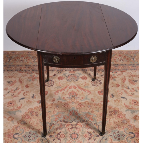 67 - A GEORGIAN MAHOGANY DROP LEAF TABLE the oval hinged top with frieze drawer and opposing mock drawer ... 