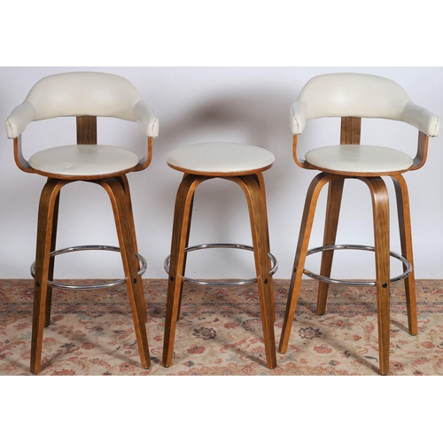 69 - A PAIR OF CONTEMPORARY BENTWOOD AND UPHOLSTERED REVOLVING HIGH STOOLS each with a shaped upholstered... 