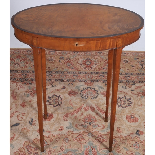 71 - A 19TH CENTURY SATINWOOD AND ROSEWOOD CROSSBANDED OCCASIONAL TABLE the oval hinged top on square tap... 