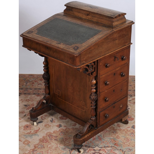 72 - A 19TH CENTURY MAHOGANY INLAID DAVENPORT the superstructure with hinged compartment above a tooled l... 