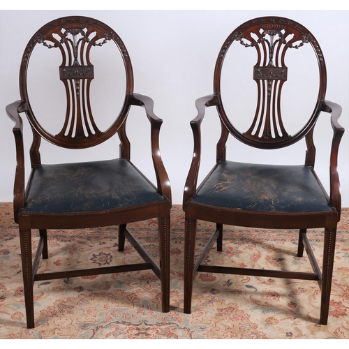 81 - A GOOD PAIR OF HEPPLEWHITE DESIGN MAHOGANY CARVERS each with an oval carved back and pierced vertica... 