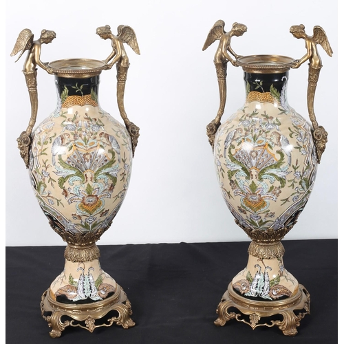 91 - A PAIR OF CONTINENTAL PORCELAIN AND GILT BRASS VASES each of bulbous form the beige ground with flor... 