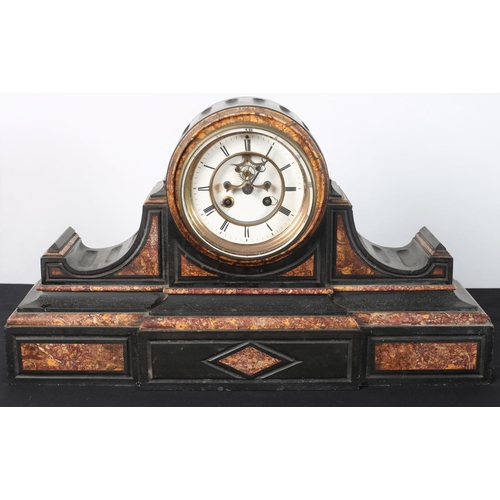 97 - A VINTAGE BLACK VEINED MARBLE MANTLE CLOCK the circular shaped case with enamel dial and Roman numer... 