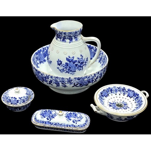 809 - A COPELAND CHINA FIVE PIECE BATHROOM SET the white ground with blue floral decoration comprising jug... 