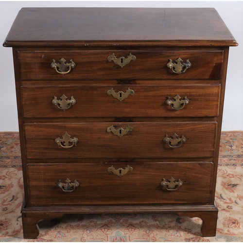 53 - A GEORGIAN MAHOGANY CHEST of rectangular outline the shaped top above four long graduated drawers wi... 