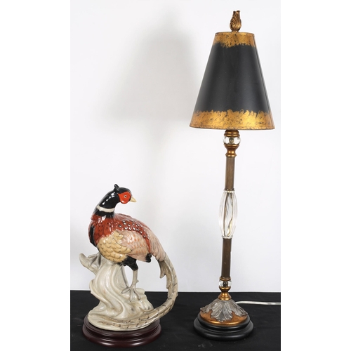 509 - A CONTINENTAL CLEAR GLASS AND GILT TABLE LAMP on an ebonised stand with shade together with A GLAZED... 