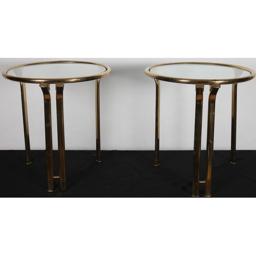 102 - A PAIR OF CONTEMPORARY BRASS AND GLAZED END TABLES each of circular outline with glazed inset on tub... 