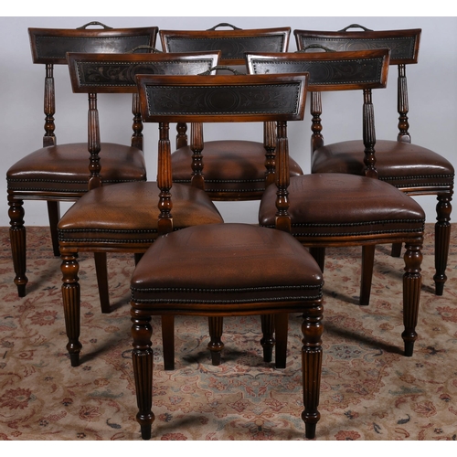 18 - A REGENCY DESIGN MAHOGANY SEVEN PIECE DINING ROOM SUITE comprising six chairs each with a curved top... 
