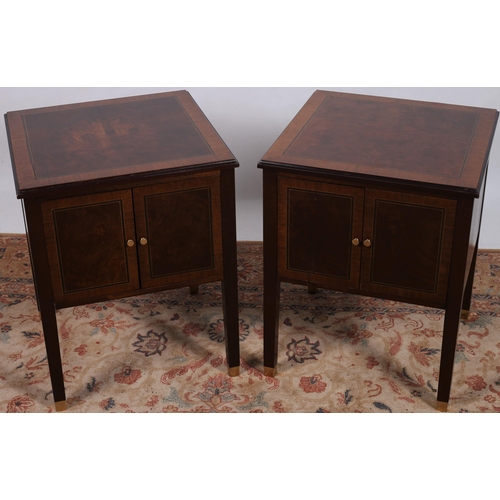 41 - A PAIR OF SHERATON DESIGN WALNUT AND MAHOGANY CROSSBANDED CUPBOARDS each of rectangular outline with... 