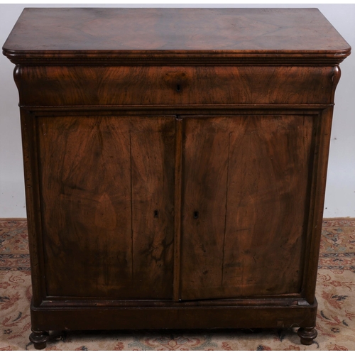 5 - A BIEDERMEIER MAHOGANY SIDE CABINET of rectangular outline with frieze drawer and cupboards on platf... 