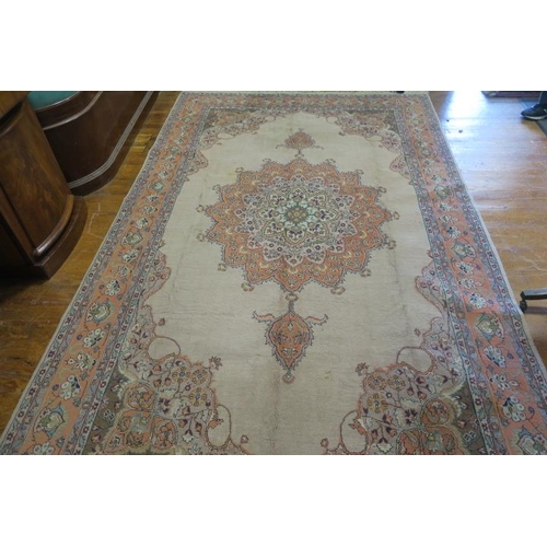 540 - A BIJAR WOOL RUG the light pink beige ground with central panel filled with shaped panels containing... 