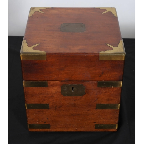 561 - A GEORGIAN MAHOGANY AND BRASS INLAID TANTALUS of rectangular form the hinged lid containing four dec... 