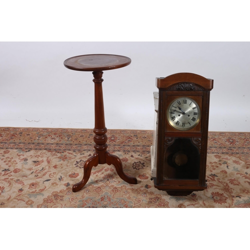 708 - A VINTAGE MAHOGANY WALL CLOCK of rectangular outline with silvered dial and Roman numerals above a b... 