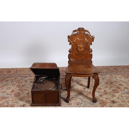 715 - A VINTAGE MAHOGANY GRAMOPHONE His Master's Voice, together with A VICTORIAN OAK HALL CHAIR the shiel... 