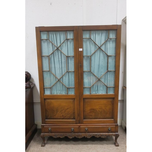 824 - AN EDWARDIAN MAHOGANY DIAMOND DOOR TWO DOOR WARDROBE with hanging rail the base with two short drawe... 