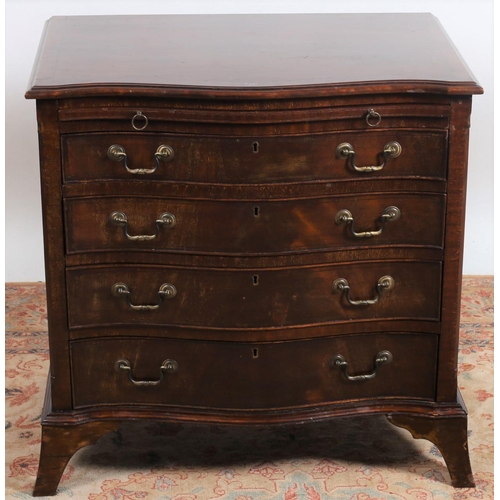 60 - A GEORGIAN DESIGN MAHOGANY CROSSBANDED CHEST of serpentine outline the shaped top above a brush and ... 