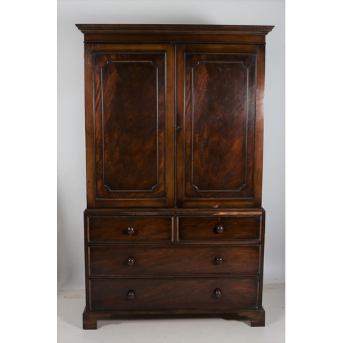 62 - A 19TH CENTURY DESIGN MAHOGANY CUPBOARD ON CHEST the dentil moulded cornice above a pair of panel do... 