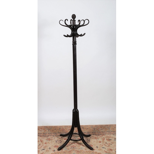 85 - A BENTWOOD COAT STAND the revolving top above a cylindrical column on quadruped splayed legs 
182cm ... 