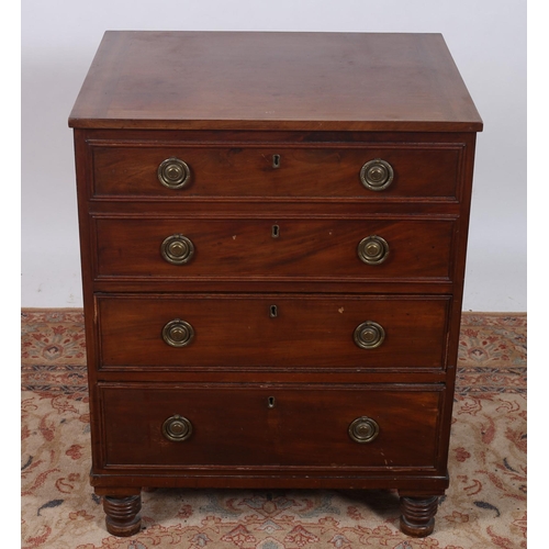 255 - A GEORGIAN MAHOGANY CHEST of rectangular outline the hinged lid above two mock and two true drawers ... 