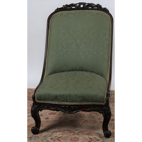 261 - A 19TH CENTURY CARVED MAHOGANY AND UPHOLSTERED SIDE CHAIR the pierced carved top rail above an uphol... 