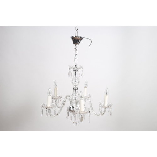 364 - A CONTINENTAL CUT GLASS FIVE BRANCH CHANDELIER the baluster column above a dish under tier issuing f... 