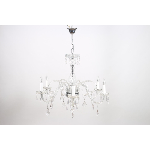 372 - A CONTINENTAL CUT GLASS SIX BRANCH CHANDELIER hung with faceted pendants 
92cm drop x 80cm (w)