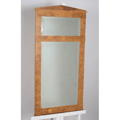 820 - A BURR WALNUT COMPARTMENTED PIER MIRROR the rectangular bevelled glass plates within a moulded frame... 