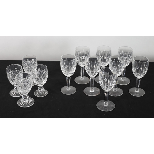 116 - A SET OF EIGHT WATERFORD CUT GLASS WHITE WINE GLASSES together with a set of four Waterford cut glas... 